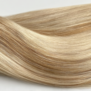 Cart 1 Close-up of light blonde Hair Extension Genius Wefts showing silky smooth texture and natural shine.